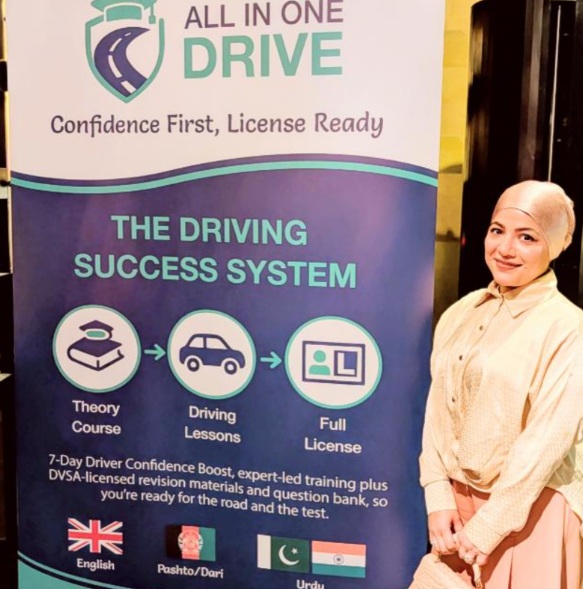Lina Wahidi beside the All In One Drive banner
